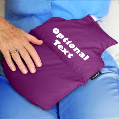 Wheat Bags Bottle Shaped Heat Pack Lifestyle Image shown in Purple Cotton Fabric