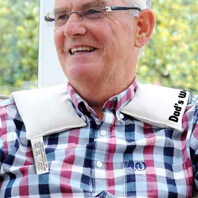 Wheat Bags Shoulder &amp; Neck Heating Pad in Use with Personalised Text