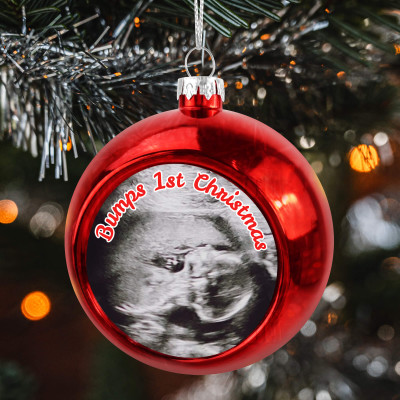 Bumps First Christmas Baubles In Use Hanging on a Christmas Tree