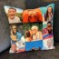 Photo Memory Cushion with many collage photos on a HappySnapGifts® Photo Cushion
